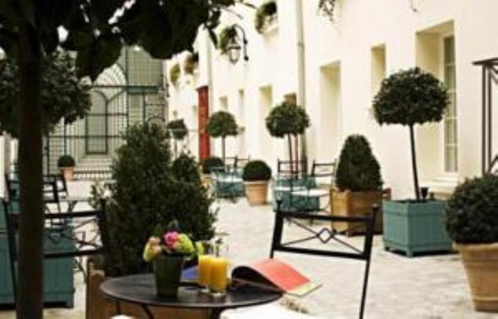 Hotel Suites Unic Renoir Saint-Germain - Resim 11