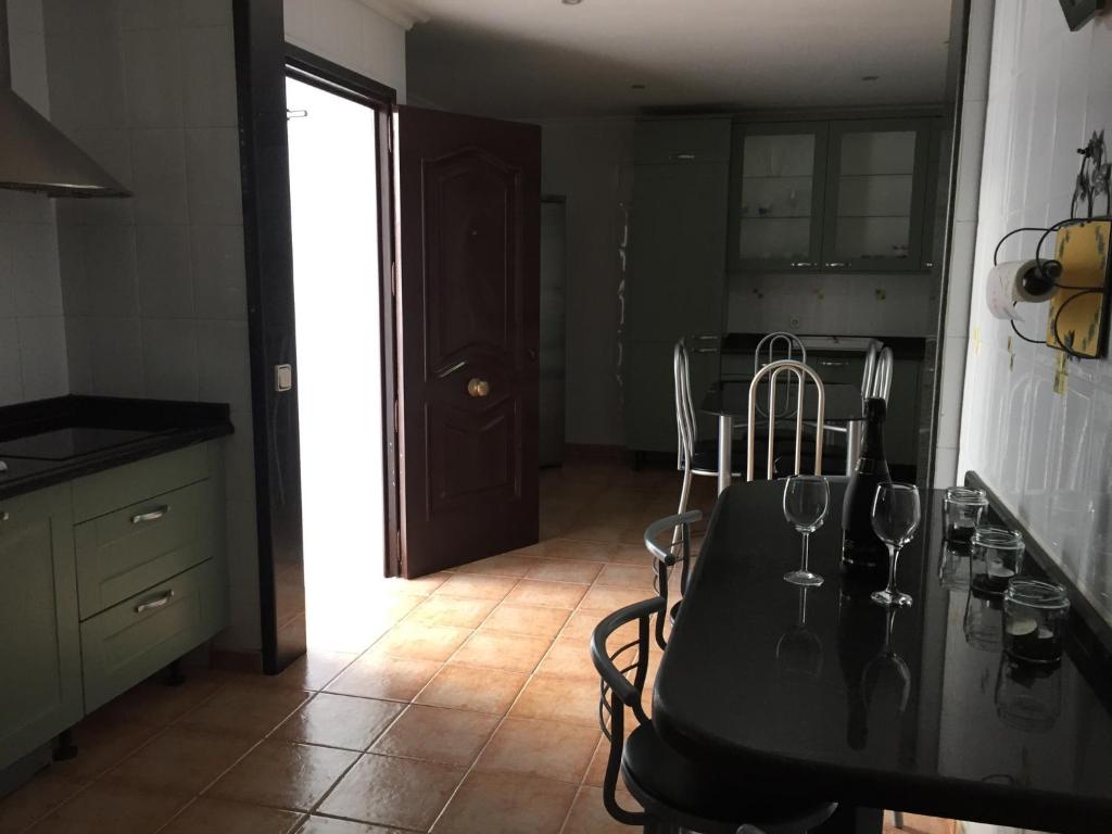 Kuchyňa alebo kuchynka v ubytovaní Casa la Bufona
