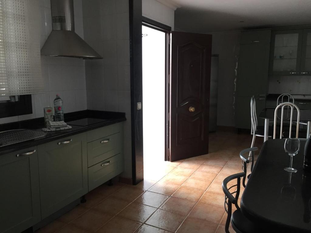 Kuchyňa alebo kuchynka v ubytovaní Casa la Bufona