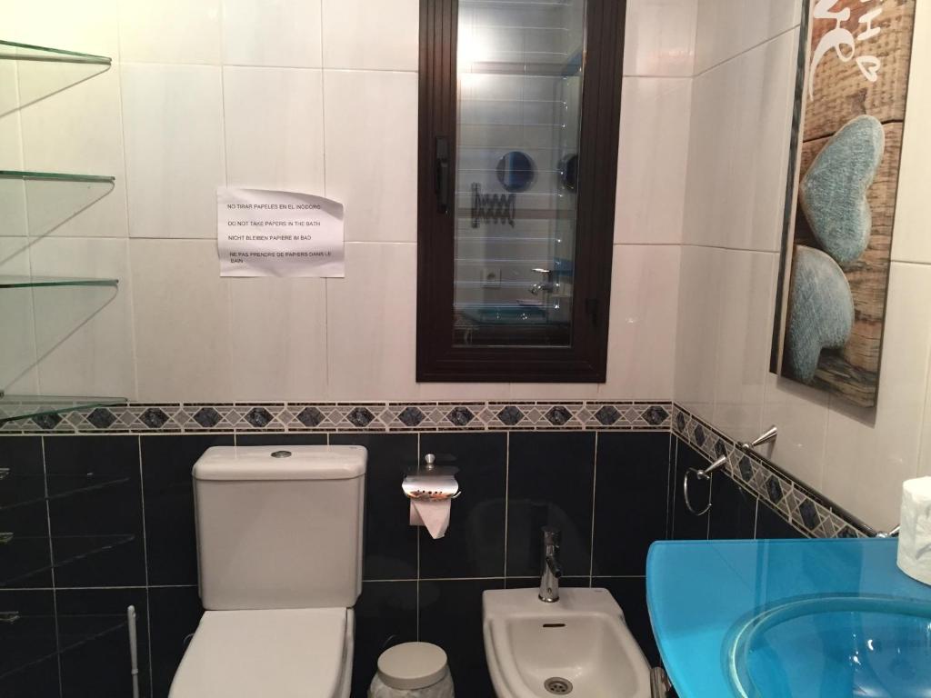 Kúpeľňa v ubytovaní Casa la Bufona