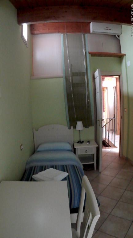 Postel nebo postele na pokoji v ubytování La Casetta Di Atri