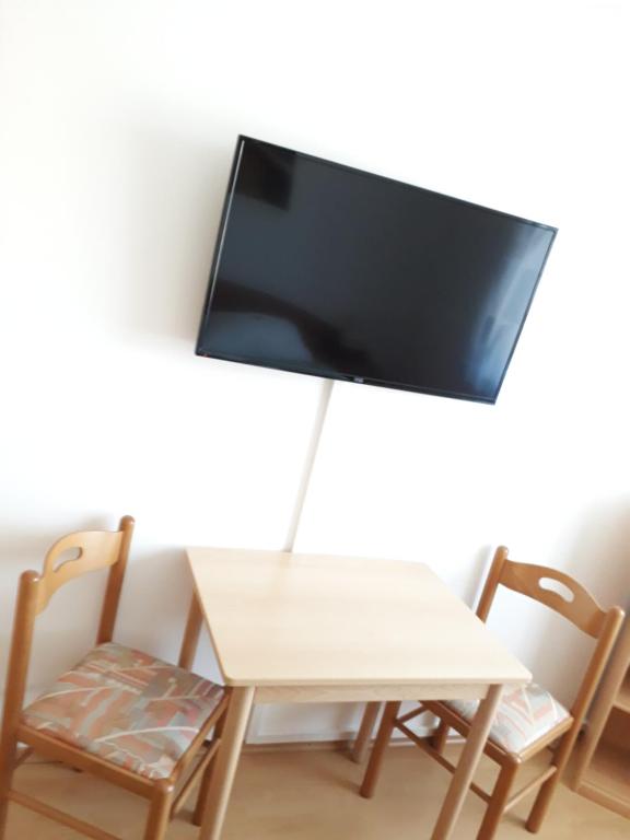 TV a/nebo společenská místnost v ubytování Gästehaus Klug