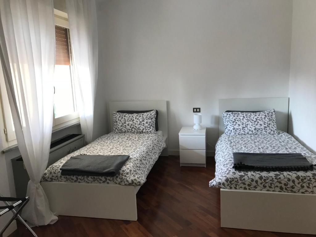 Postel nebo postele na pokoji v ubytování Guesthouse Flora