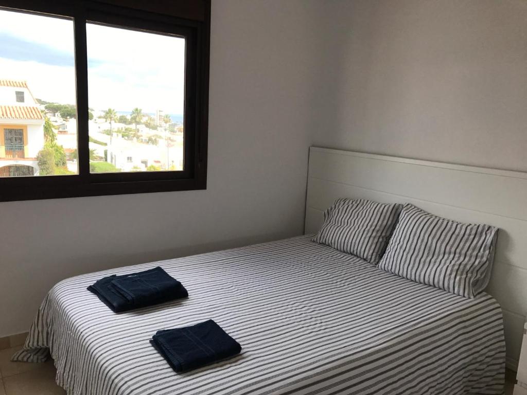 Posteľ alebo postele v izbe v ubytovaní Adosado en residencial