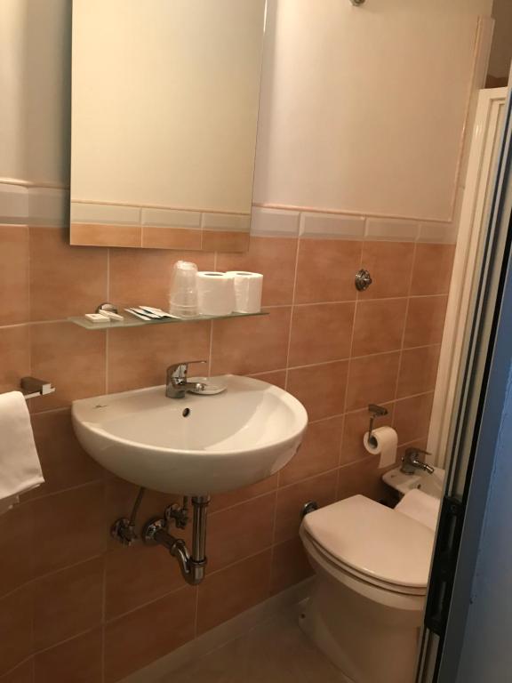 Koupelna v ubytování Hotel Romagna