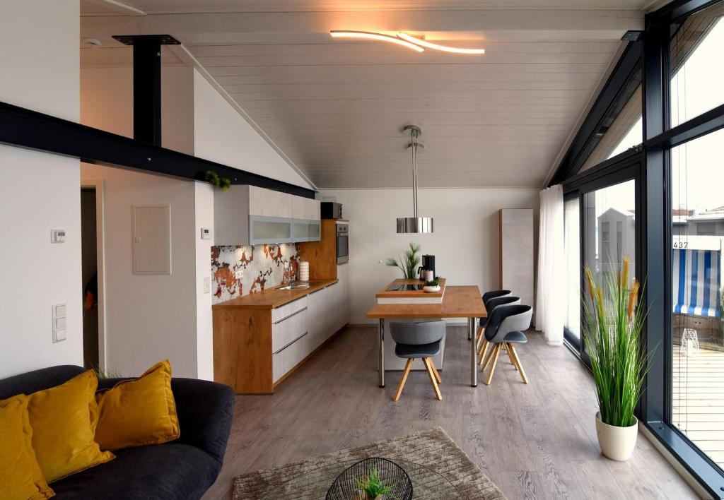 Kuchyň nebo kuchyňský kout v ubytování PETIT-CHALET AM HAINER SEE