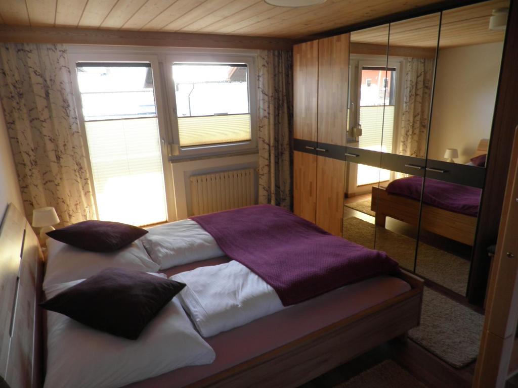 Postel nebo postele na pokoji v ubytování Haus Glätzle
