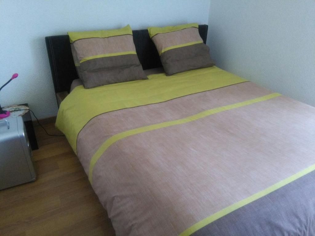 Postel nebo postele na pokoji v ubytování Sombang