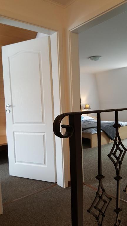 Posteľ alebo postele v izbe v ubytovaní Apartament rodzinny z ogrodem - Bliżej Zdroju