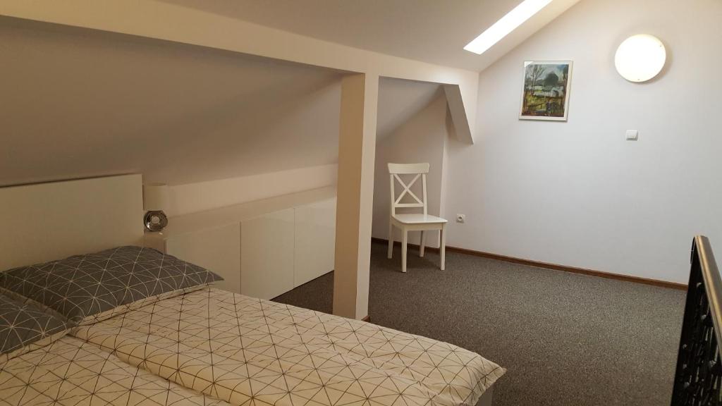 Posteľ alebo postele v izbe v ubytovaní Apartament rodzinny z ogrodem - Bliżej Zdroju
