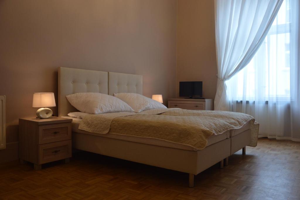 Postel nebo postele na pokoji v ubytování Ada Aparthouse