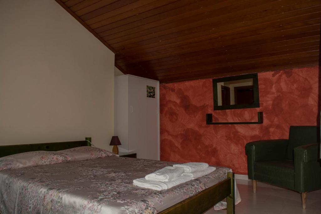 Postel nebo postele na pokoji v ubytování Staggia Studios
