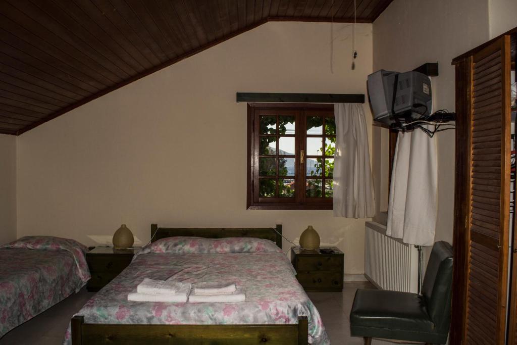 Postel nebo postele na pokoji v ubytování Staggia Studios