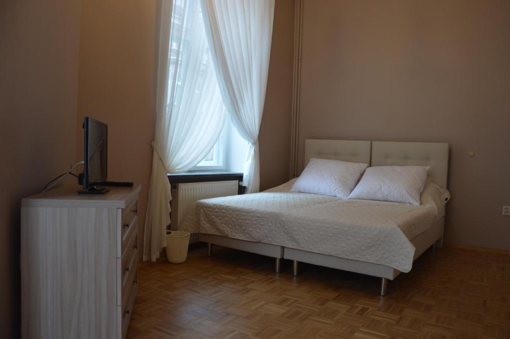 Postel nebo postele na pokoji v ubytování Ada Aparthouse