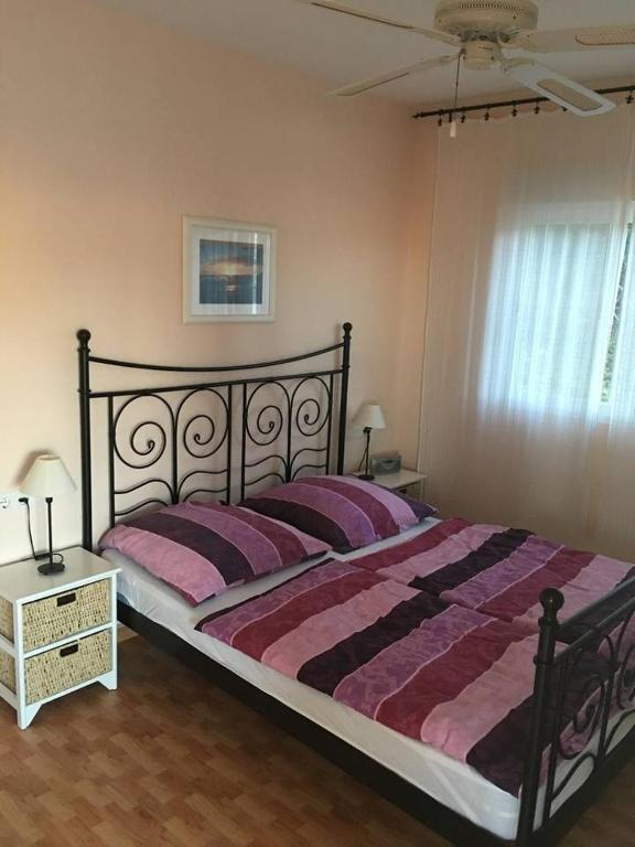Postel nebo postele na pokoji v ubytování Vista Bonita Apartments