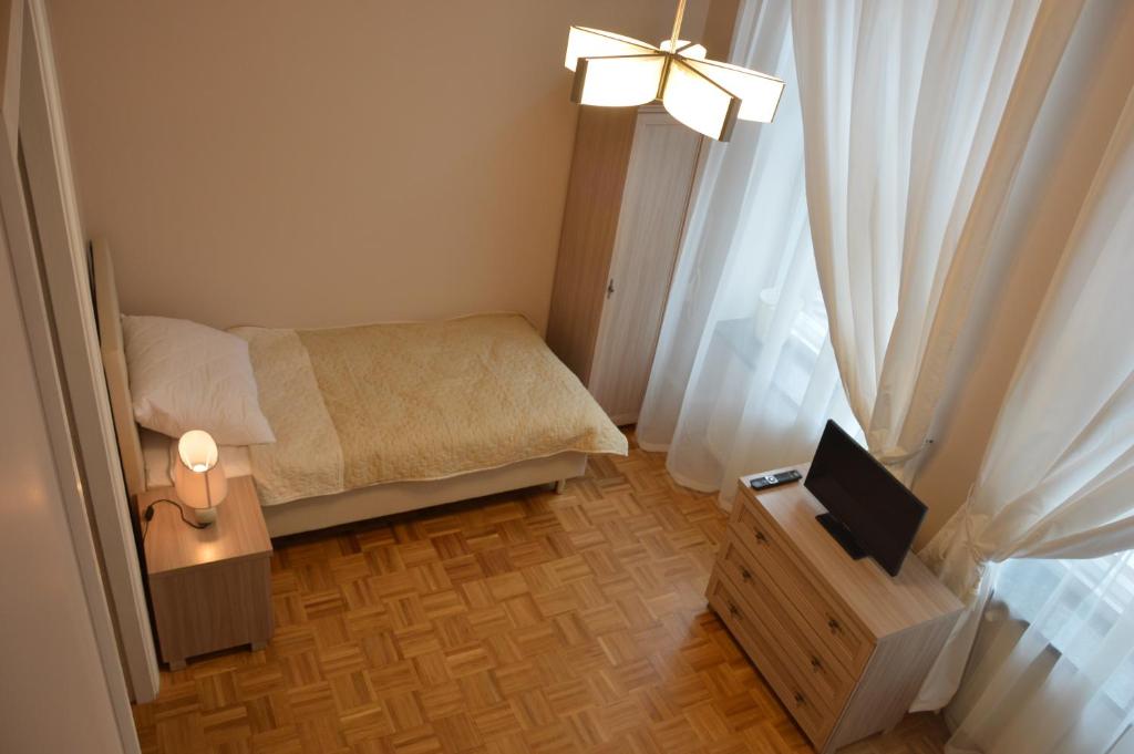 Postel nebo postele na pokoji v ubytování Ada Aparthouse