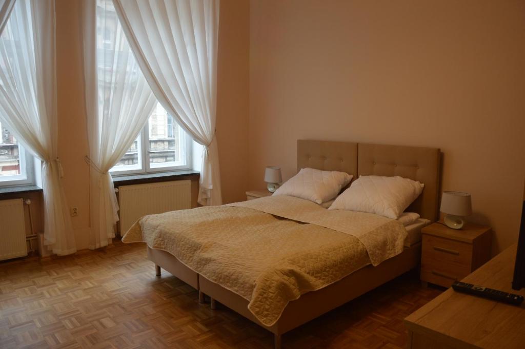 Postel nebo postele na pokoji v ubytování Ada Aparthouse