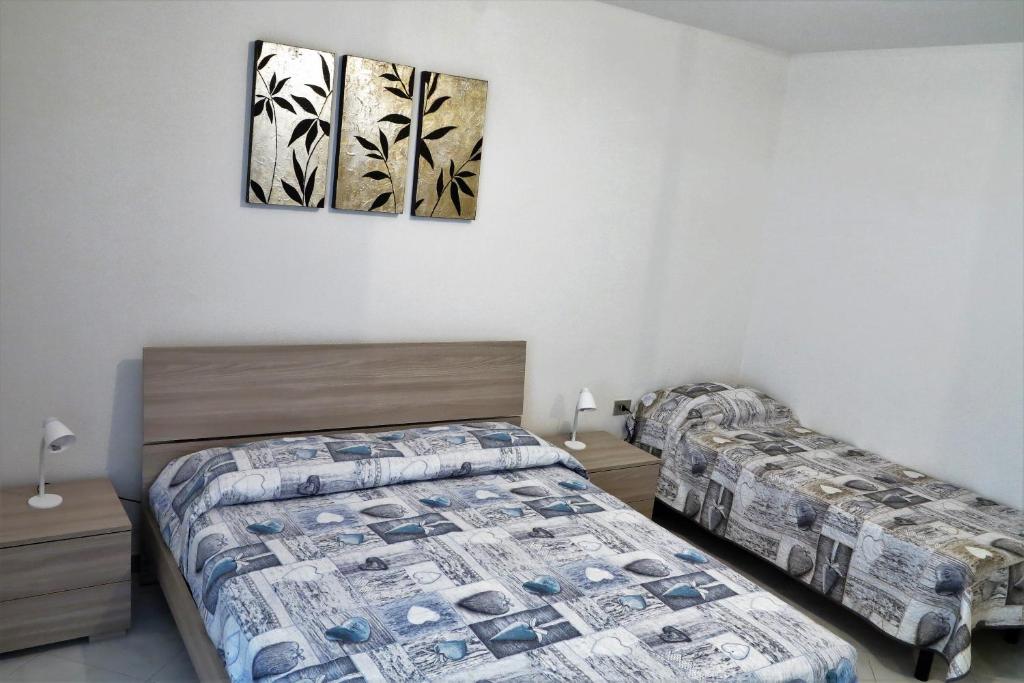 A bed or beds in a room at Yellowhouse