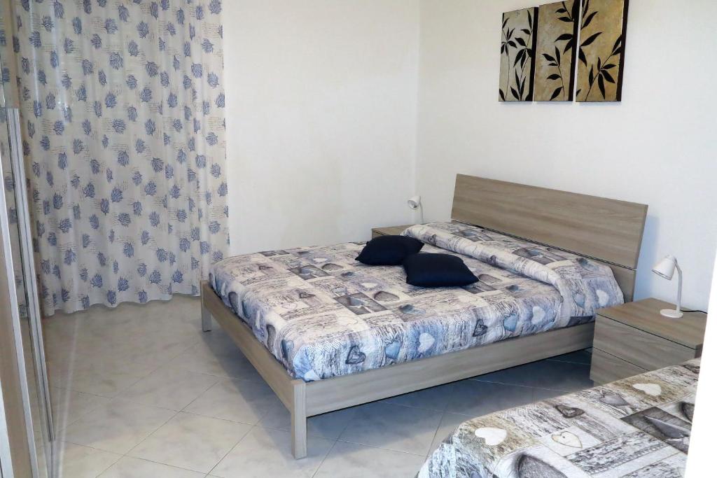 A bed or beds in a room at Yellowhouse