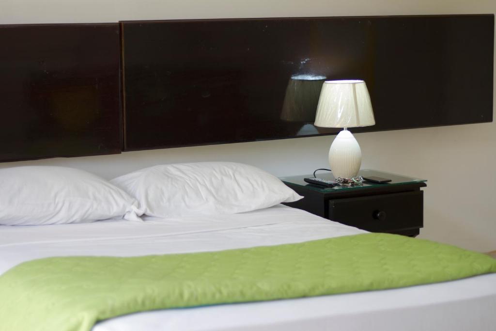 Ένα ή περισσότερα κρεβάτια σε δωμάτιο στο Apartamentos Casa Brenes
