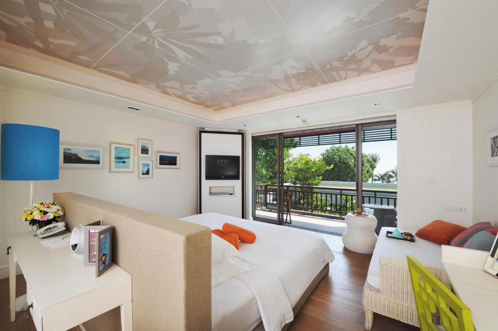 Postel nebo postele na pokoji v ubytování Rest Detail Hotel Hua Hin
