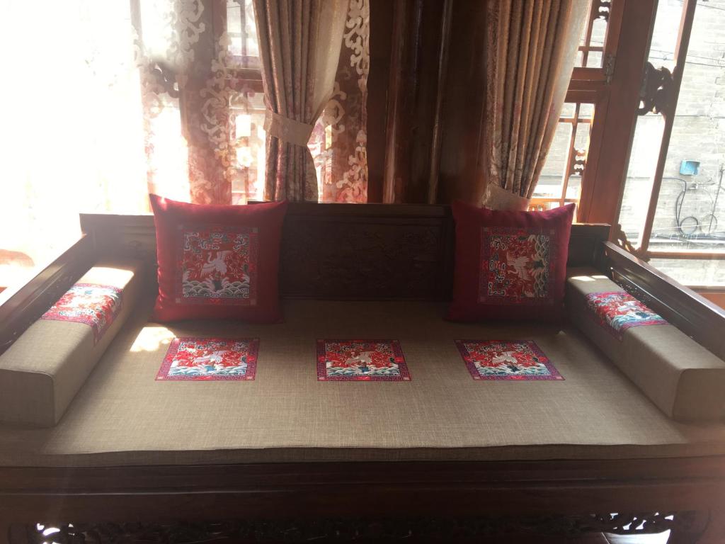 Posezení v ubytování Pingyao HongJingYuanGuesthouse