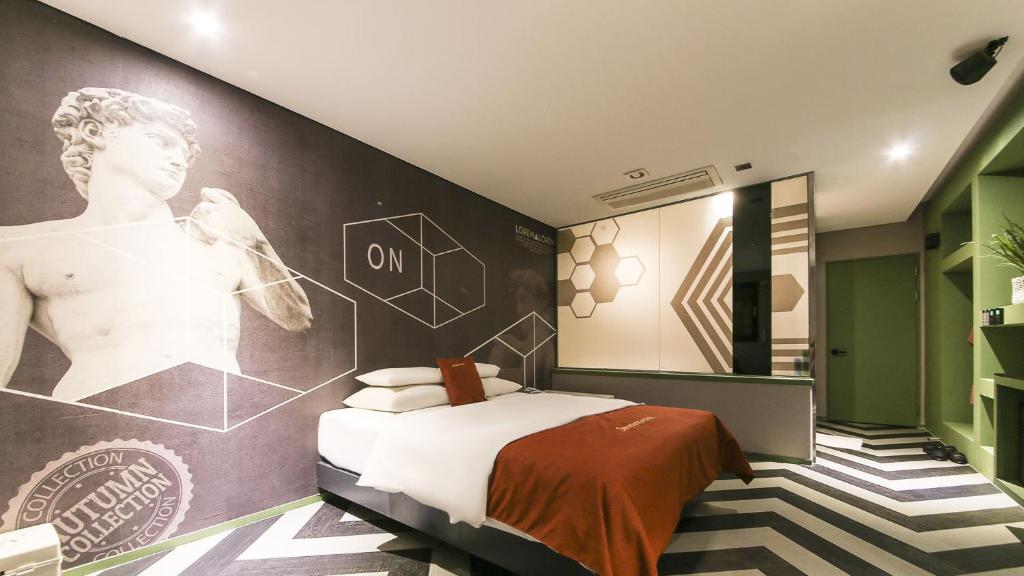 Postel nebo postele na pokoji v ubytování Hotel ON