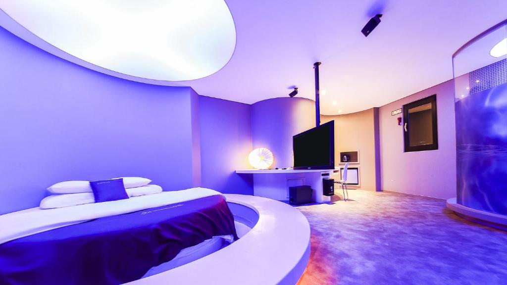 Postel nebo postele na pokoji v ubytování Hotel ON
