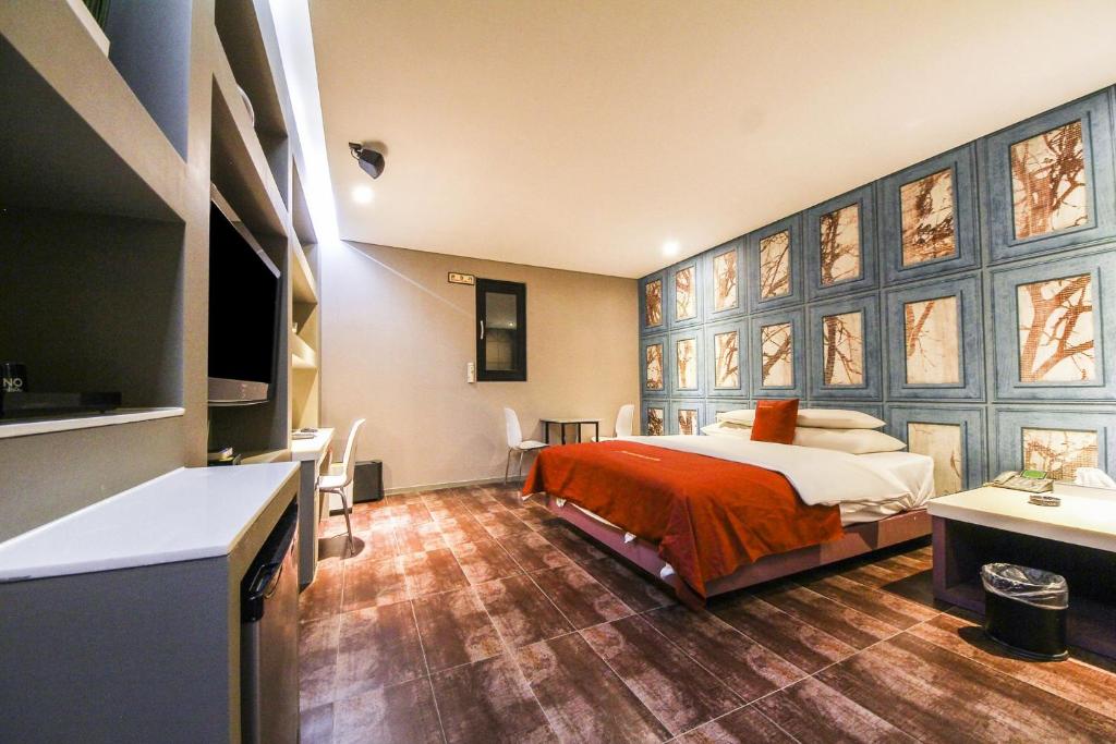 Postel nebo postele na pokoji v ubytování Hotel ON