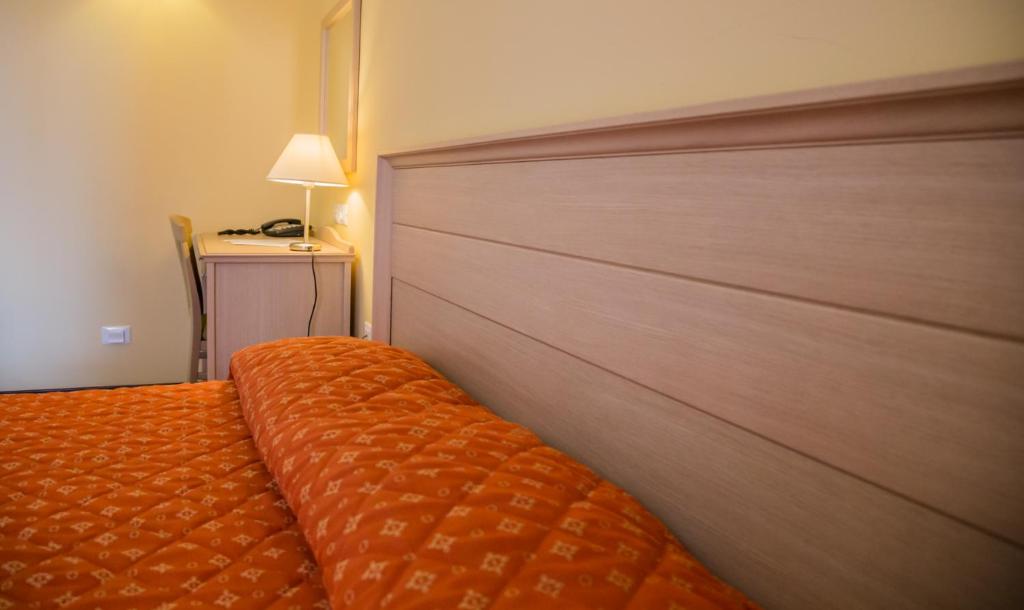 Postel nebo postele na pokoji v ubytování Il Parco Sul Mare Resort & SPA