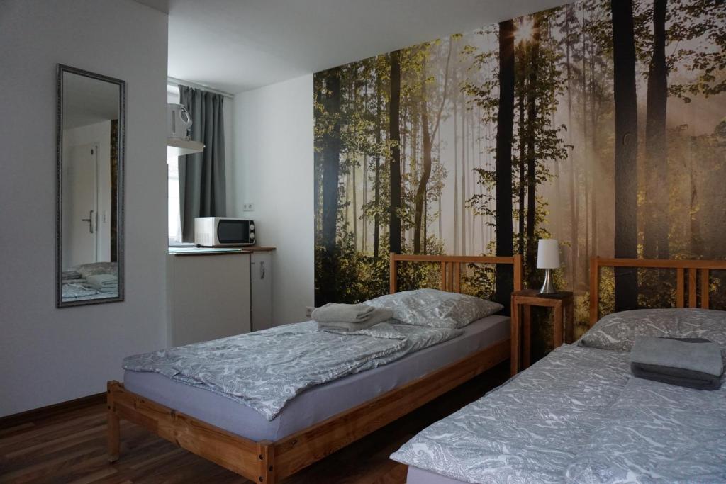 Postel nebo postele na pokoji v ubytování Mitte24
