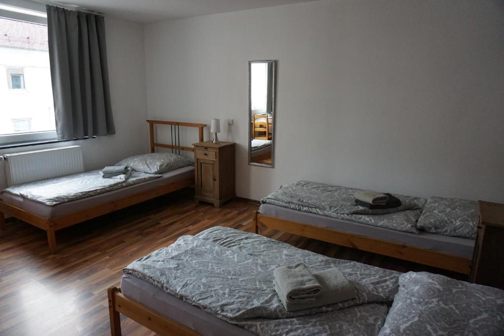 Postel nebo postele na pokoji v ubytování Mitte24