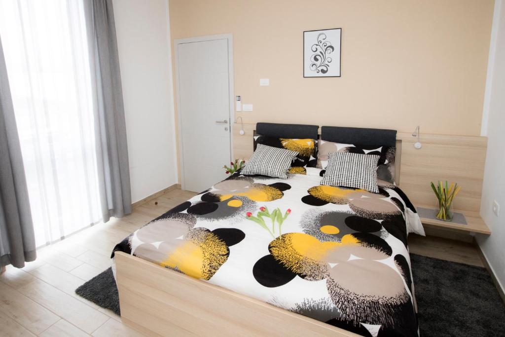 Postel nebo postele na pokoji v ubytování Apartma Grže