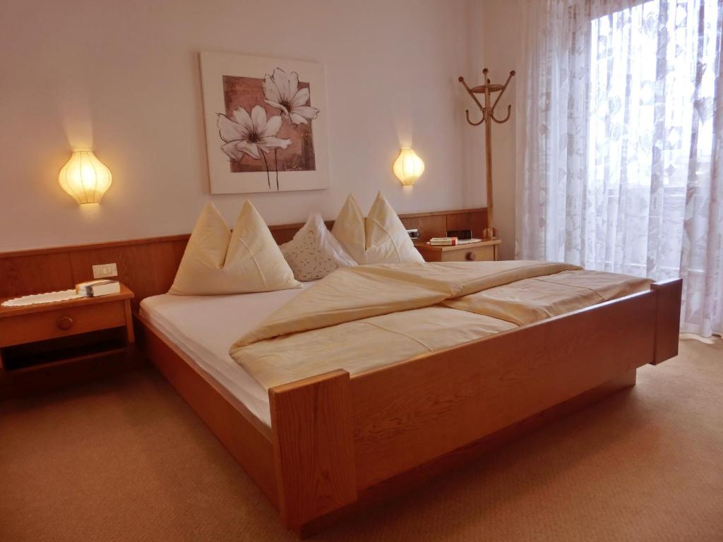 Postel nebo postele na pokoji v ubytování Appartments Innerhofer