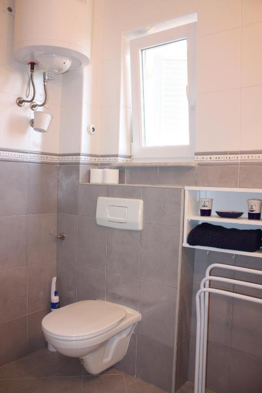 Koupelna v ubytování Apartments JTV Simuni