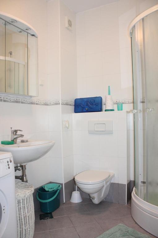Koupelna v ubytování Apartments JTV Simuni