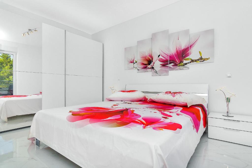 Posteľ alebo postele v izbe v ubytovaní Penthouse Lush Makarska
