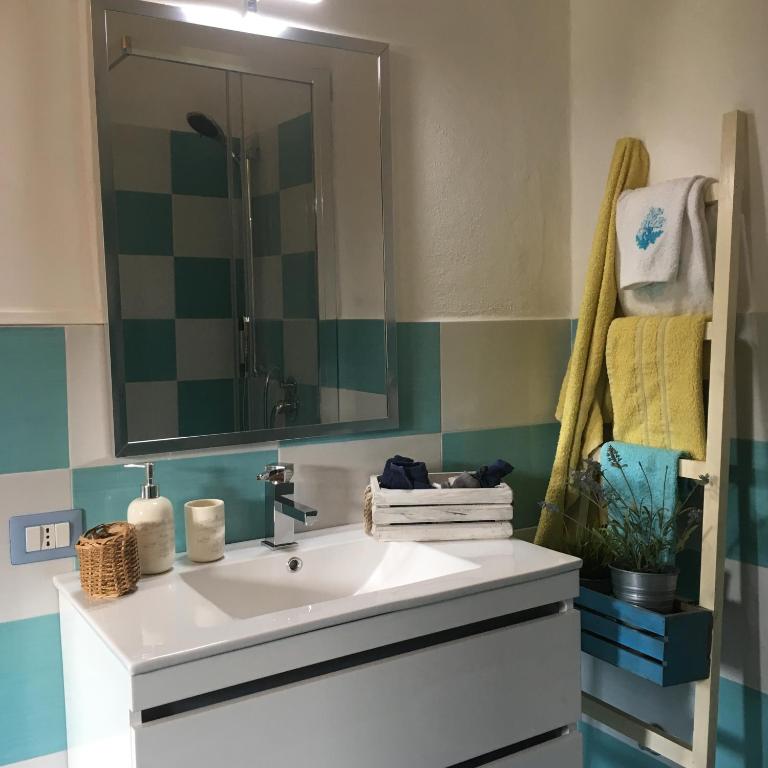 Koupelna v ubytování Rooms Romangia