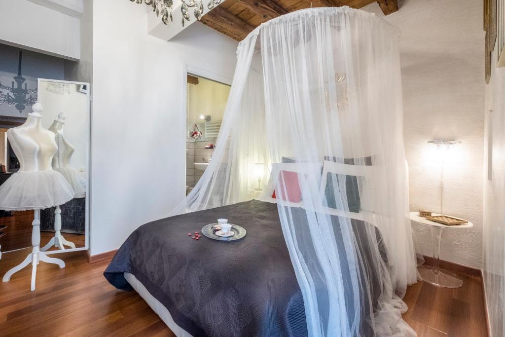 Postel nebo postele na pokoji v ubytování Abbraccio di Romeo