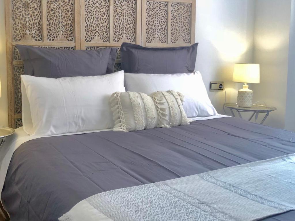 A bed or beds in a room at MALAGAJARA 61