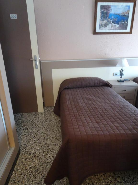 Posteľ alebo postele v izbe v ubytovaní Hostal Internacional
