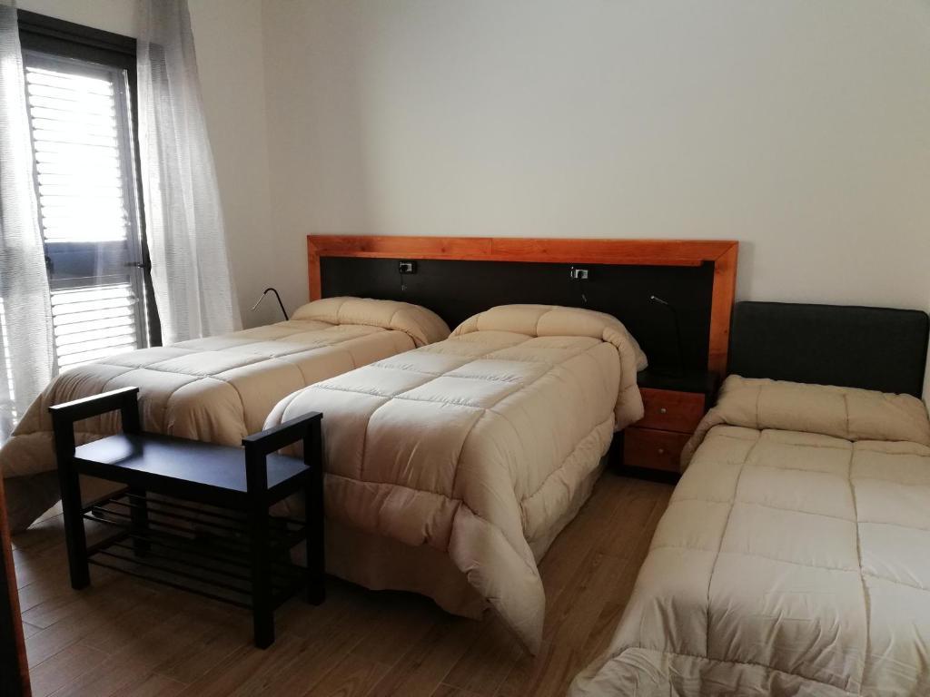 Łóżko lub łóżka w pokoju w obiekcie B&B Controtempo