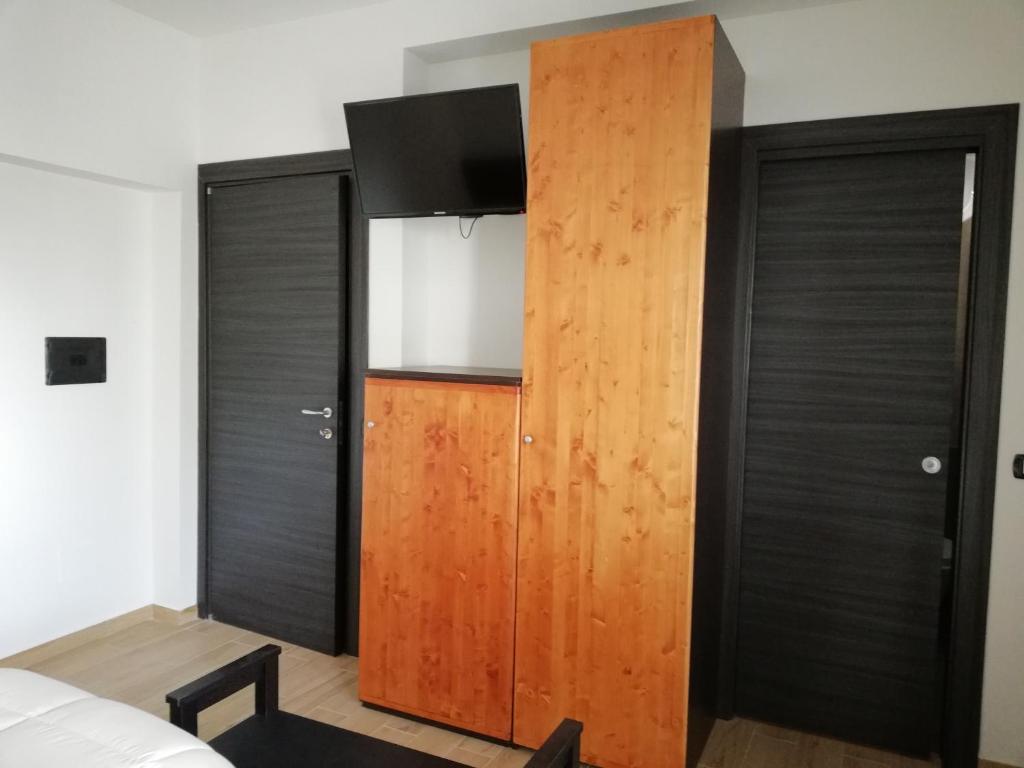 Łóżko lub łóżka w pokoju w obiekcie B&B Controtempo