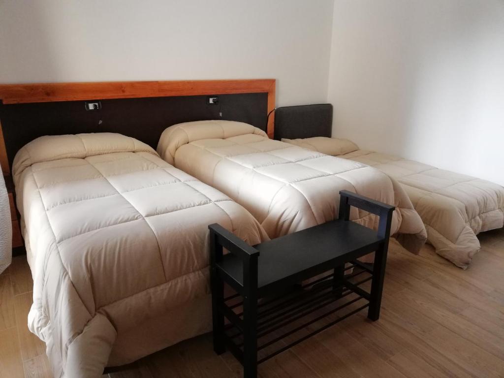 Łóżko lub łóżka w pokoju w obiekcie B&B Controtempo
