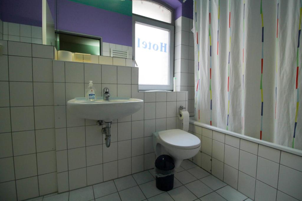 Koupelna v ubytování Hotel Ahrberg Viertel