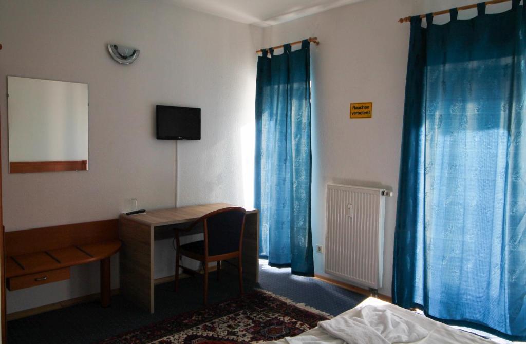 TV a/nebo společenská místnost v ubytování Hotel Ahrberg Viertel