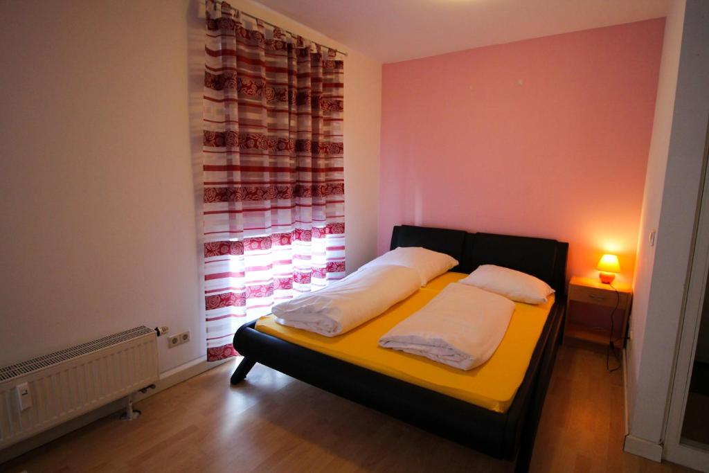Postel nebo postele na pokoji v ubytování Hotel Ahrberg Viertel
