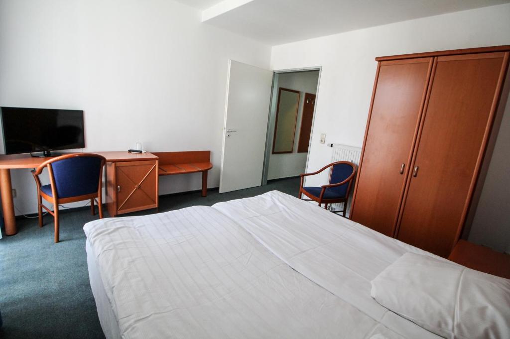 TV a/nebo společenská místnost v ubytování Hotel Ahrberg Viertel
