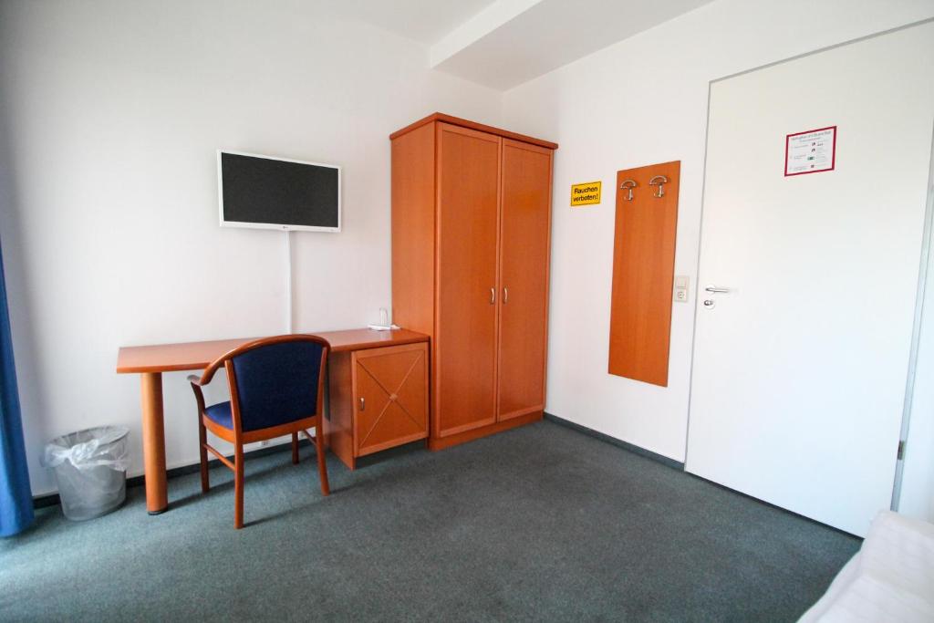 TV a/nebo společenská místnost v ubytování Hotel Ahrberg Viertel