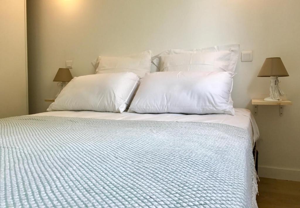 Postel nebo postele na pokoji v ubytování Propriété Malva appartement margherita